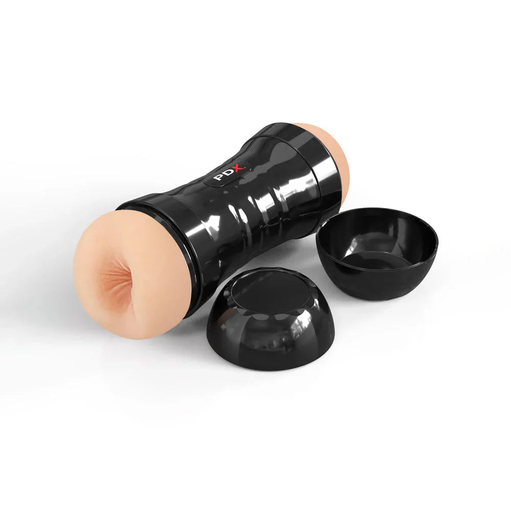 Flip-A-Pussy Over lying down with both black end caps removed and set beside it
