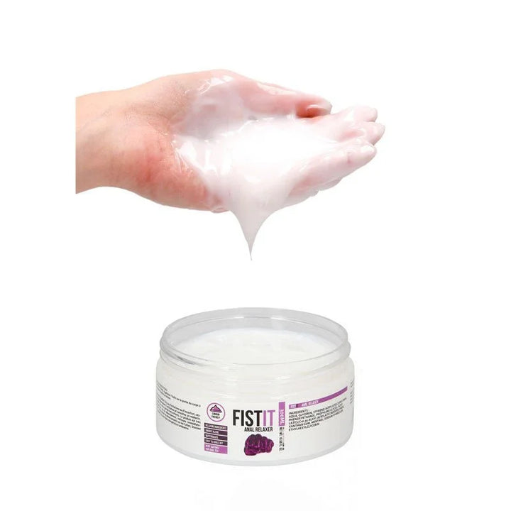 Pharmquests Fist-It Anal Relaxer Lubricant 300ml, lube dripping from a cupped hand above the open tub