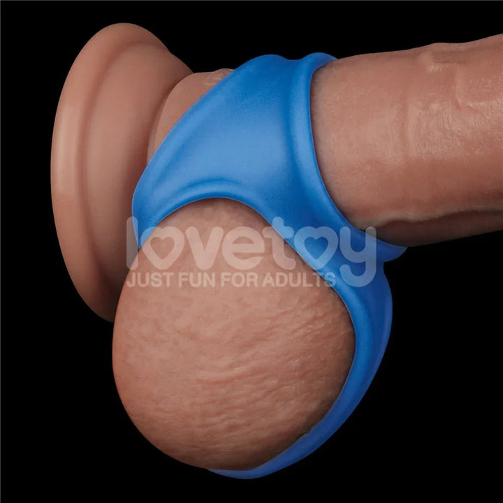 Blue Trio Grip Enhancer fitted on a realistic model, cradling the shaft and balls