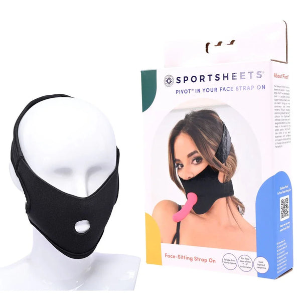 Sportsheets Pivot In Your Face Strap On on a mannequin head beside its retail box