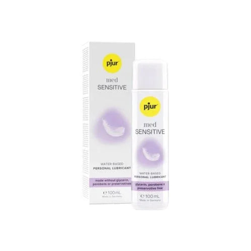 pjur med Sensitive Glide, white 100 ml bottle beside its lilac retail box
