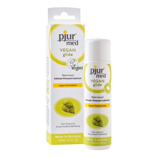 pjur med Vegan Glide, 100 ml bottle beside its green vegan-formulation box