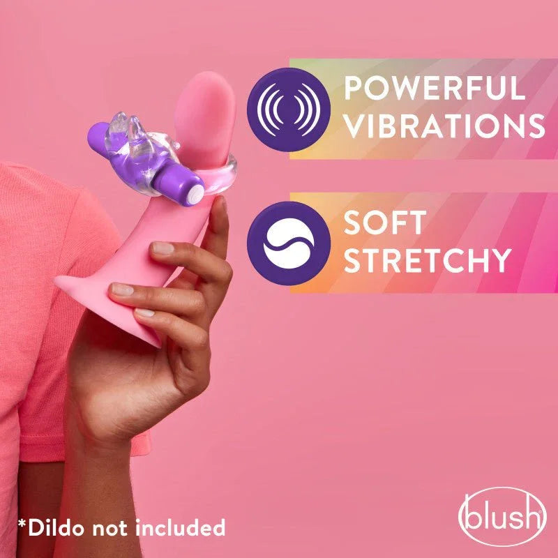 Purple Bull C-ring stretched over a pink dildo in hand, powerful vibrations panel