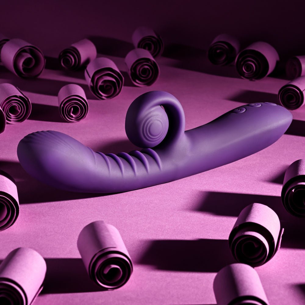 Playboy CURLICUE - Purple 23.5 cm USB Rechargeable Rabbit Vibrator – Sex toys NZ by Naughtyhut. Discreet delivery nationwide.