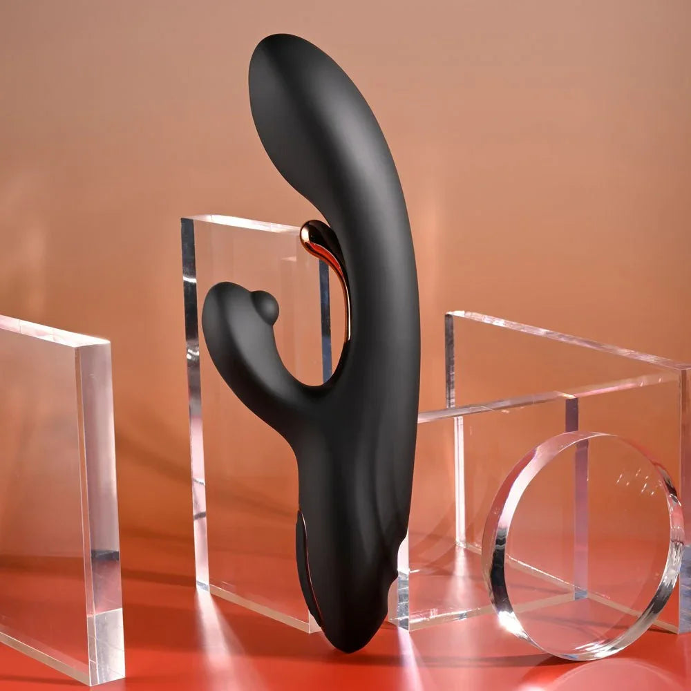 Black Aureus rabbit vibrator upright in side profile, curved shaft leaning back