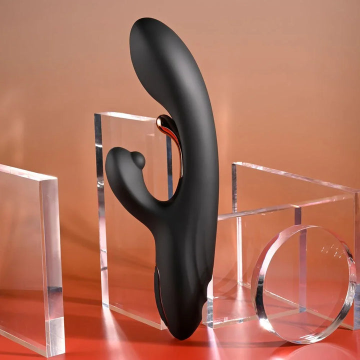 Black Aureus rabbit vibrator upright in side profile, curved shaft leaning back
