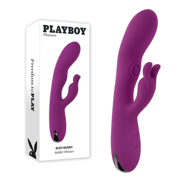 Playboy Pleasure Busy Bunny tapping rabbit vibrator in purple beside its retail box