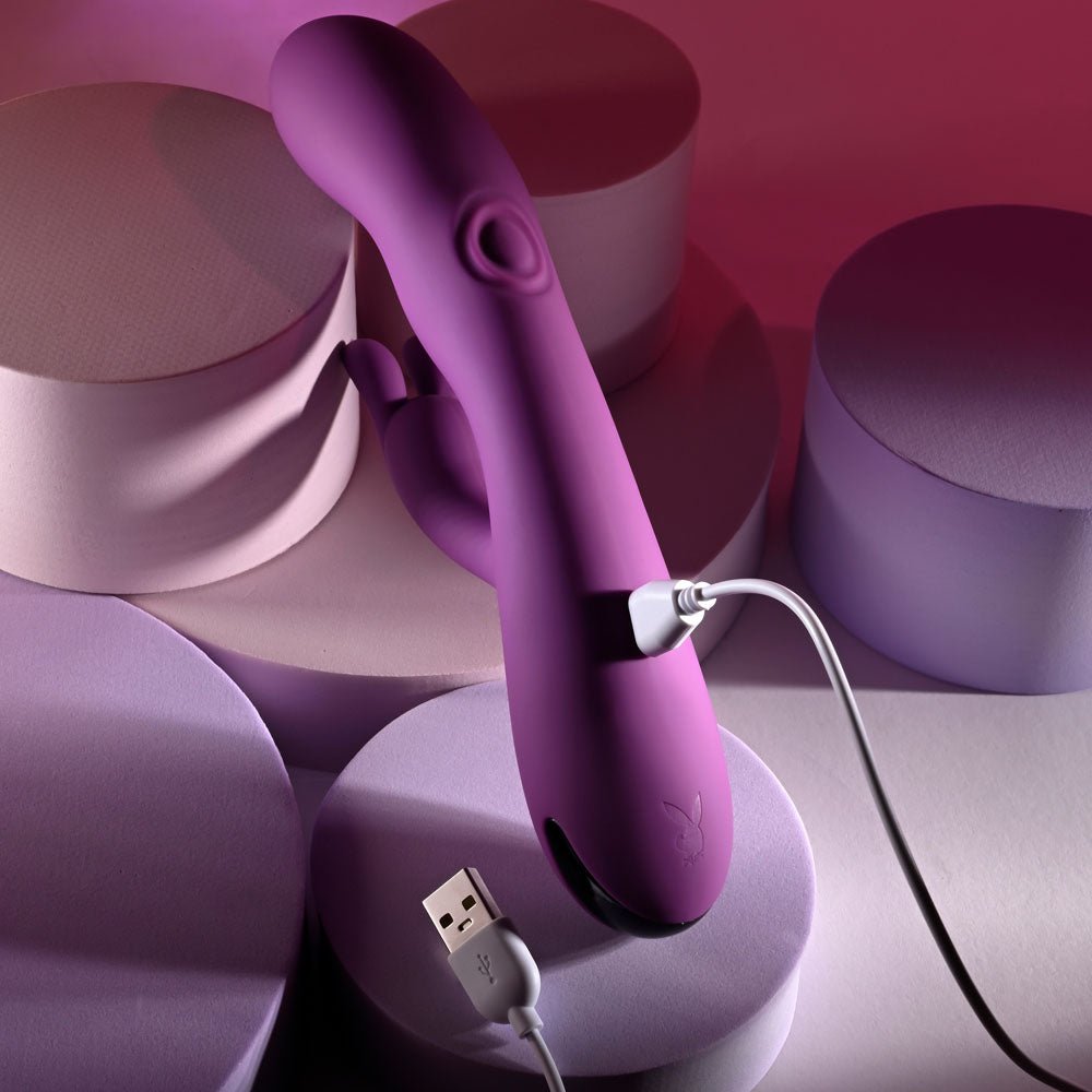 Buy Playboy Pleasure BUSY BUNNY - Purple 22.6 cm USB Rechargeable Rabbit Vibrator with Tapping Shaft – Naughtyhut NZ sex toys online. Discreet delivery & top brands.