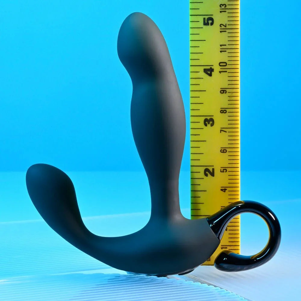 Black Come Hither prostate massager beside a ruler at about 5 inches