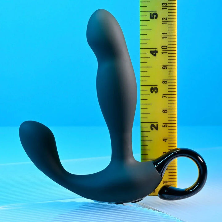 Black Come Hither prostate massager beside a ruler at about 5 inches