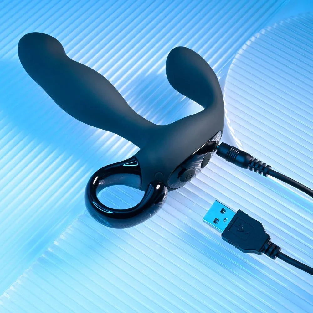 Black Come Hither with its USB charging cable plugged in beside the pull ring