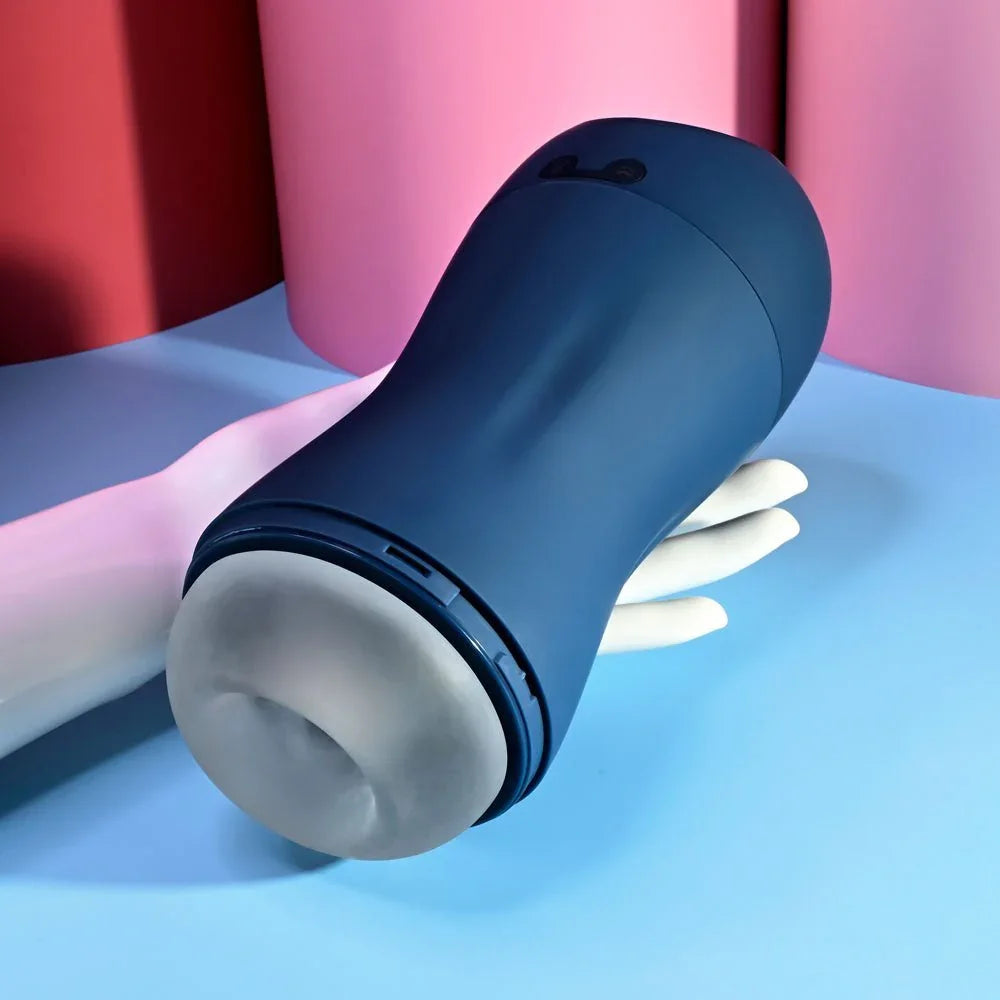 Gusto masturbator tilted to show the soft white sleeve inside the navy shell