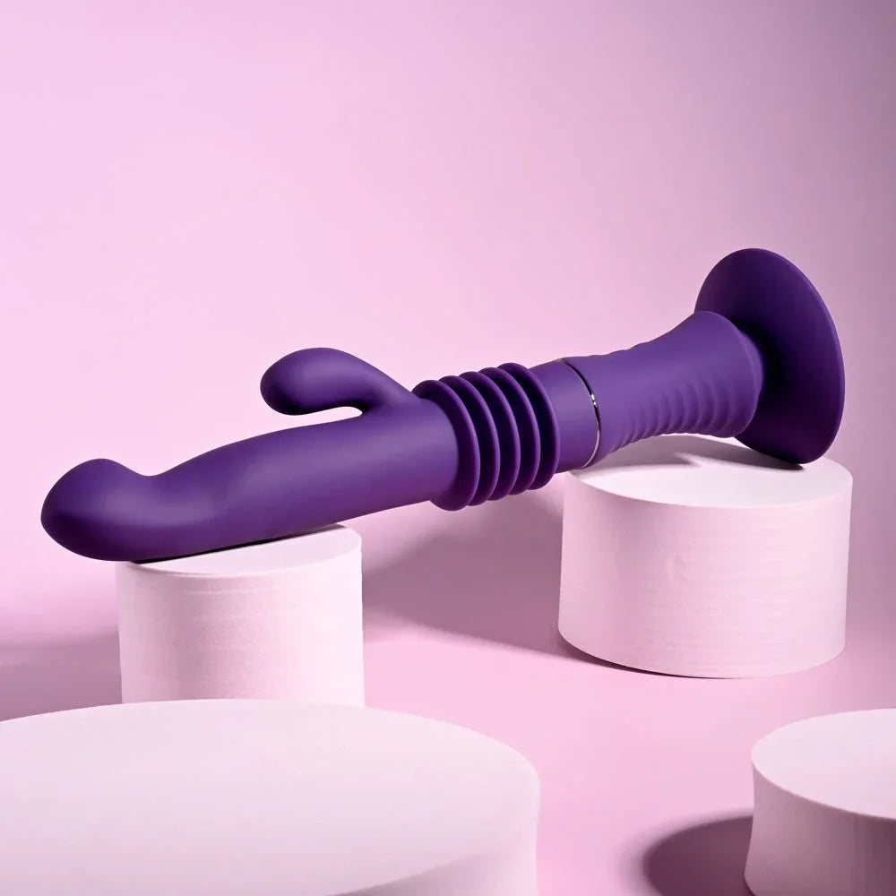 Purple Hoppy Ending lying horizontally across white cylinders, suction base at right