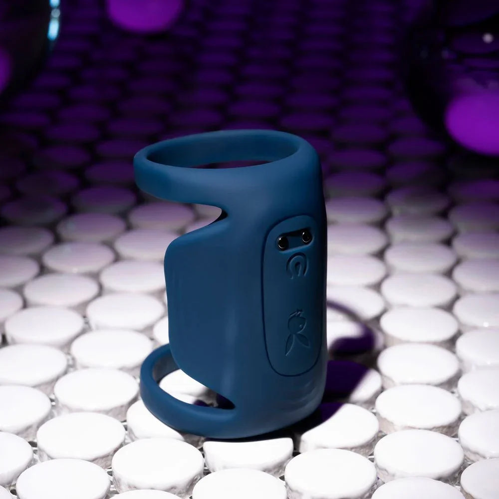 Close view of the Jet Pack control buttons and Playboy bunny on dark blue silicone