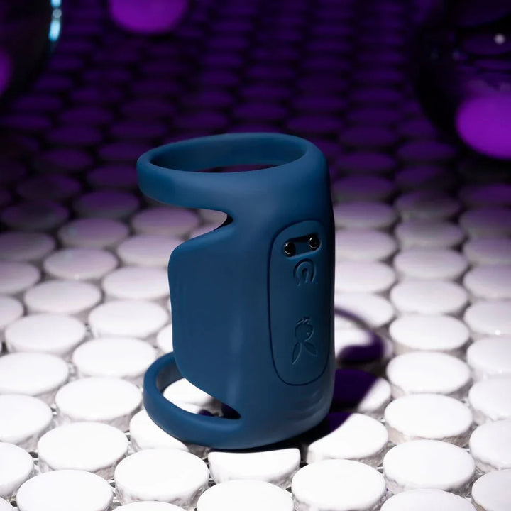 Close view of the Jet Pack control buttons and Playboy bunny on dark blue silicone