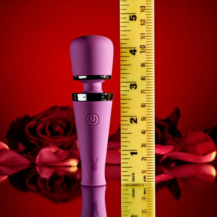 Purple Mic Drop wand upright against a ruler at about 4.5 inches