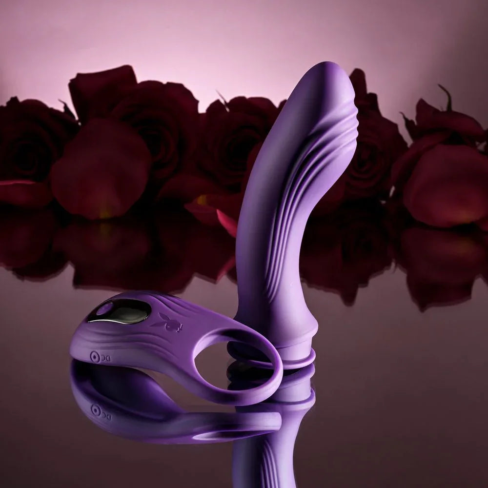 Purple Mix & Match vibrator upright with its C-ring attachment lying alongside