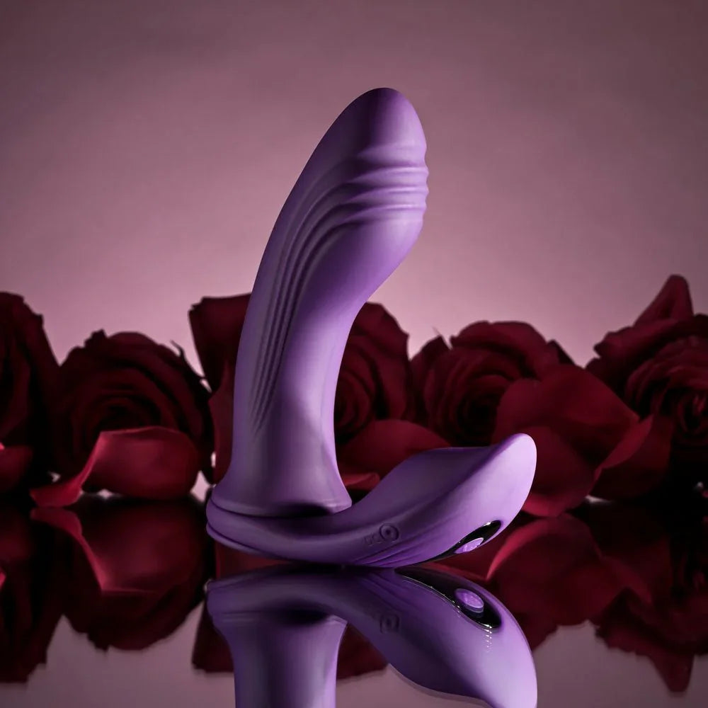 Purple Mix & Match vibrator standing upright with the C-ring attachment, red roses behind