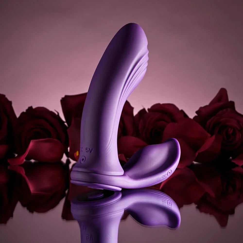 Mix & Match vibrator in purple from the side, charging contacts on the body