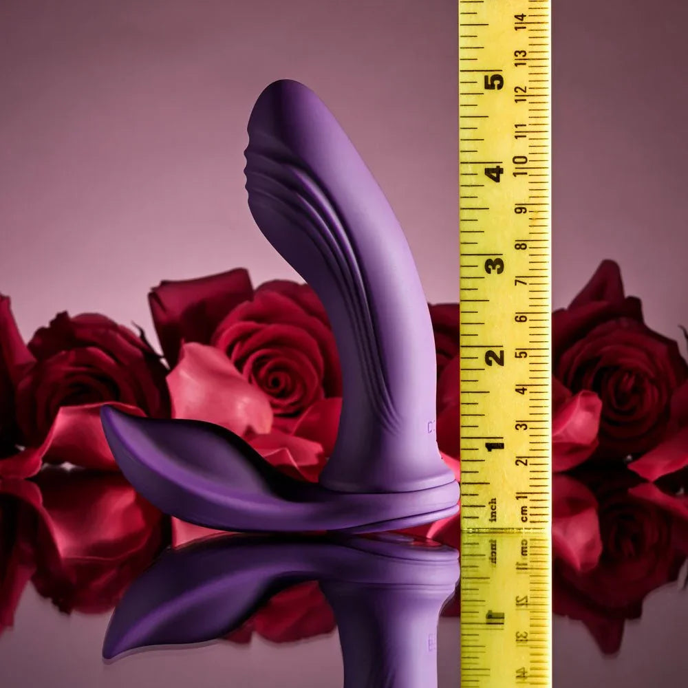 Purple Mix & Match vibrator standing against a ruler at about 5.5 inches