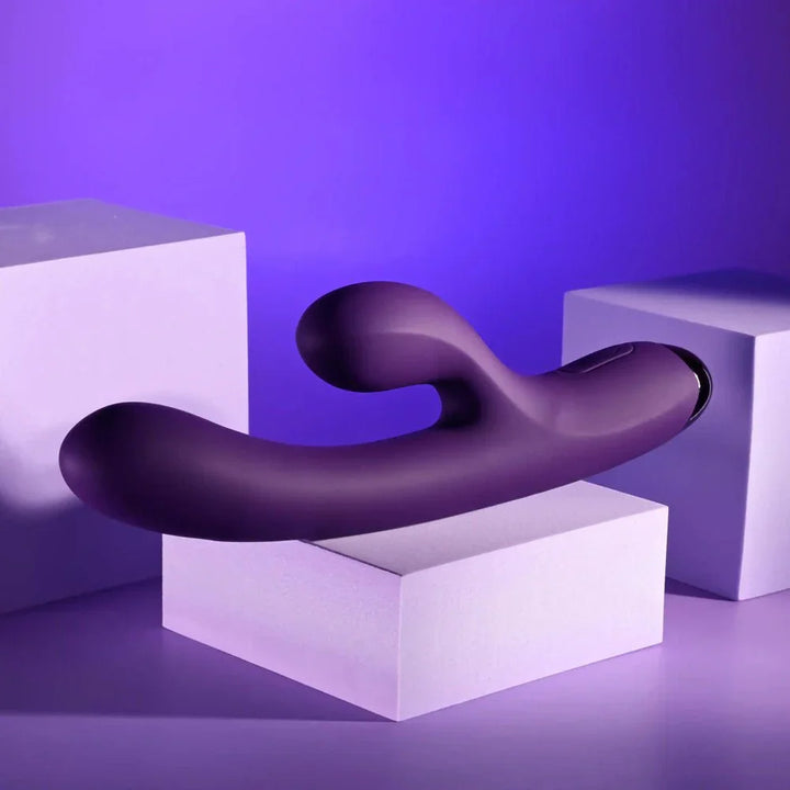 Purple New Crush lying horizontally on a white block, side profile