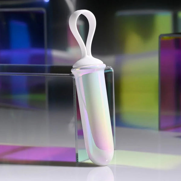 Playboy Pleasure Orgasmic Fantasy bullet vibrator in pearl with a white silicone loop