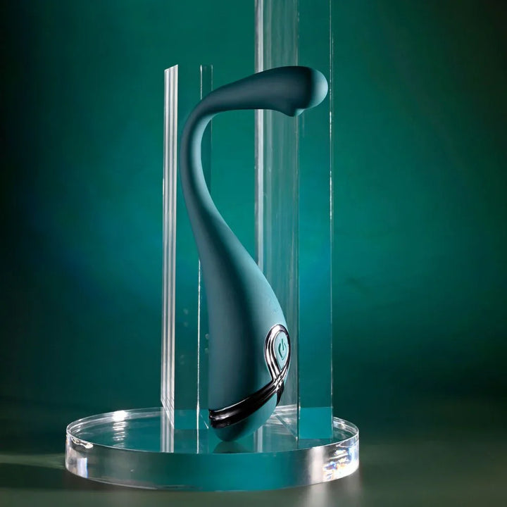 Pinpoint Perfection in green posed bent over a clear acrylic bar to show it holds shape