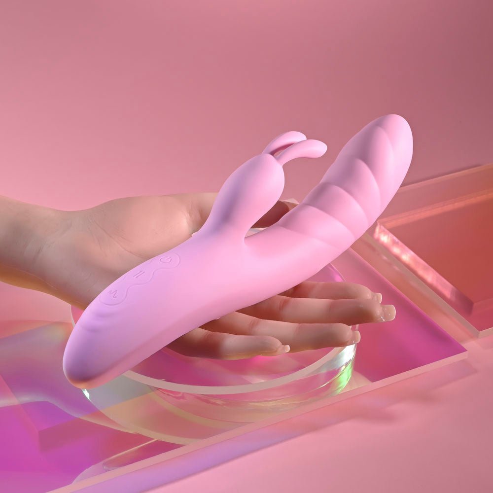 Playboy Pleasure RUB ME RIGHT - Pink 23.2 cm USB Rechargeable Thrusting Rabbit Vibrator – Sex toys NZ by Naughtyhut. Discreet delivery nationwide.