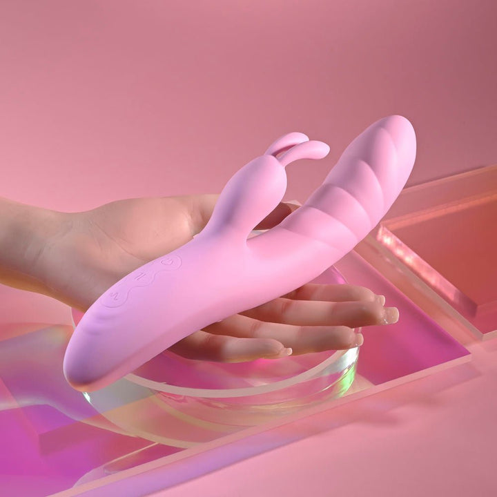 Playboy Pleasure RUB ME RIGHT - Pink 23.2 cm USB Rechargeable Thrusting Rabbit Vibrator – Sex toys NZ by Naughtyhut. Discreet delivery nationwide.
