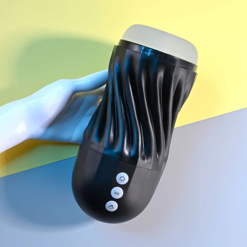 Solo stroker resting on a white display hand, control buttons in view