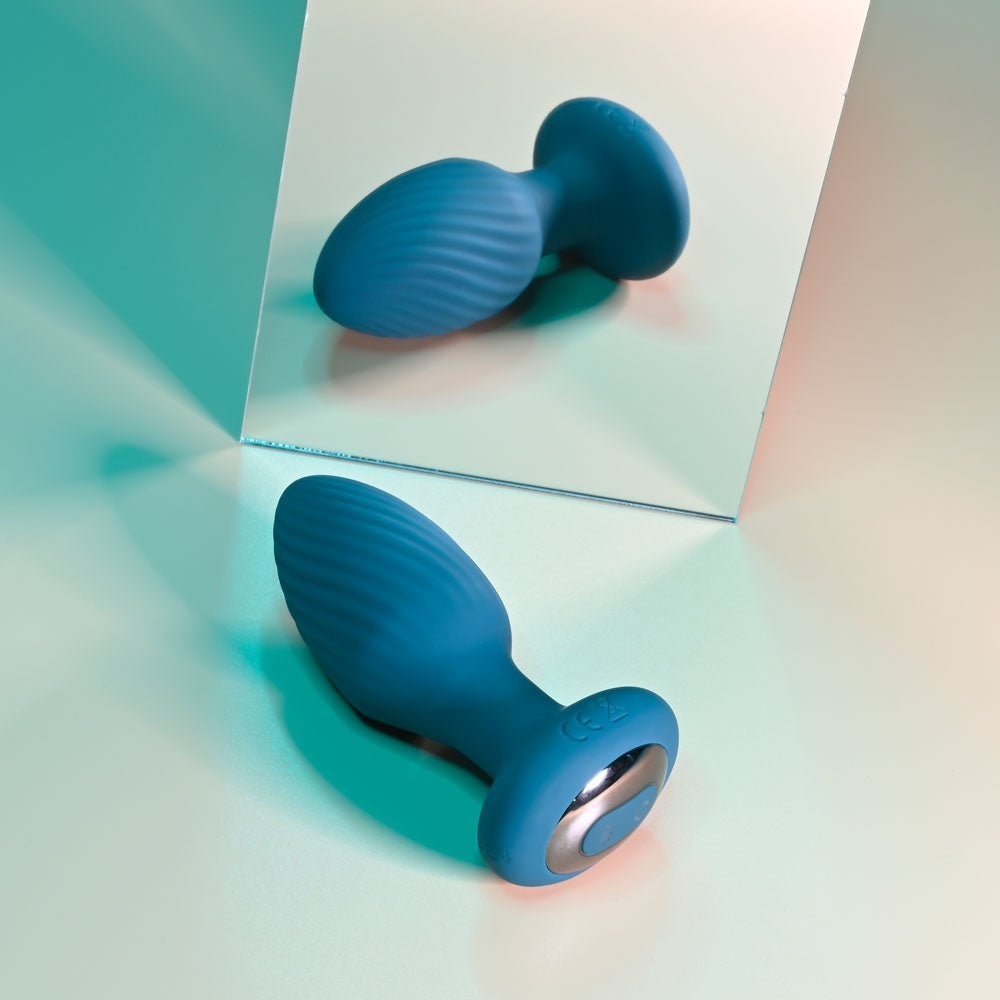 Playboy Pleasure SPINNING TAIL TEASER - Blue 9.7 cm USB Rechargeable Vibrating & Rotating Butt Plug with Wireless Remote – Sex toys NZ by Naughtyhut. Discreet delivery nationwide.
