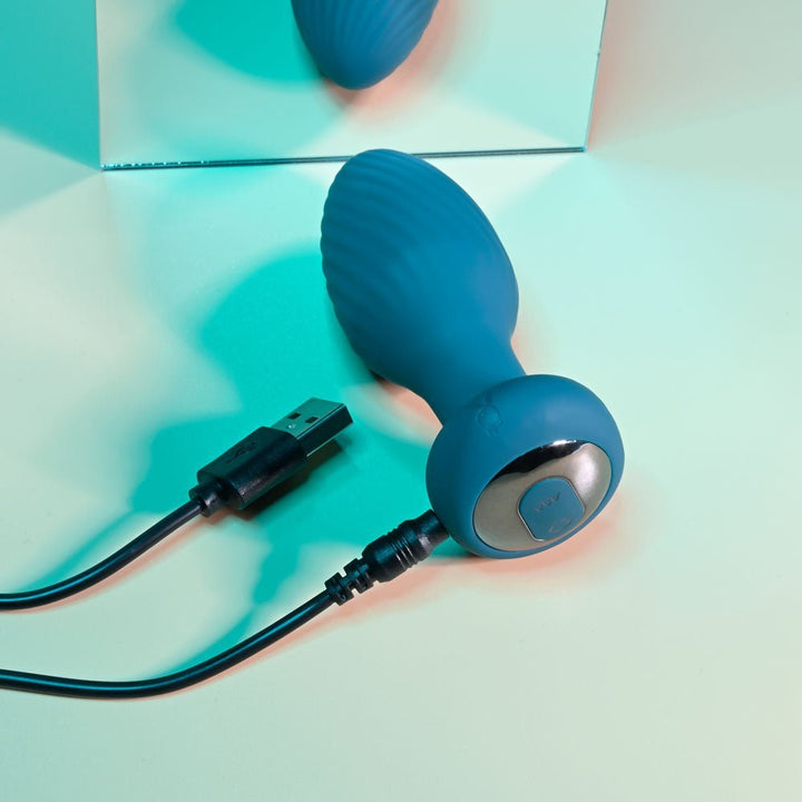 Playboy Pleasure SPINNING TAIL TEASER - Blue 9.7 cm USB Rechargeable Vibrating & Rotating Butt Plug with Wireless Remote – Sex toys NZ by Naughtyhut. Discreet delivery nationwide.