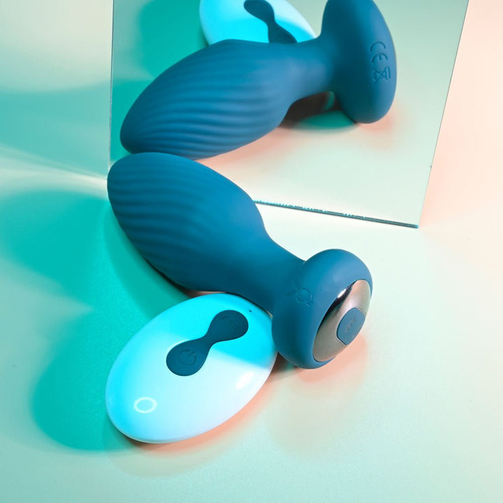 Playboy Pleasure SPINNING TAIL TEASER - Blue 9.7 cm USB Rechargeable Vibrating & Rotating Butt Plug with Wireless Remote – Sex toys NZ by Naughtyhut. Discreet delivery nationwide.
