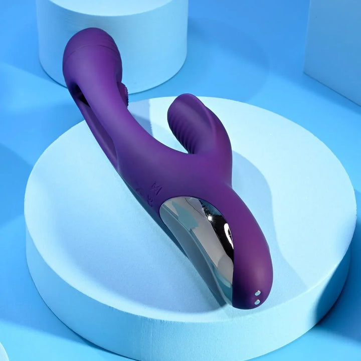 Purple Thrill standing upright on a podium, chrome insert along the handle