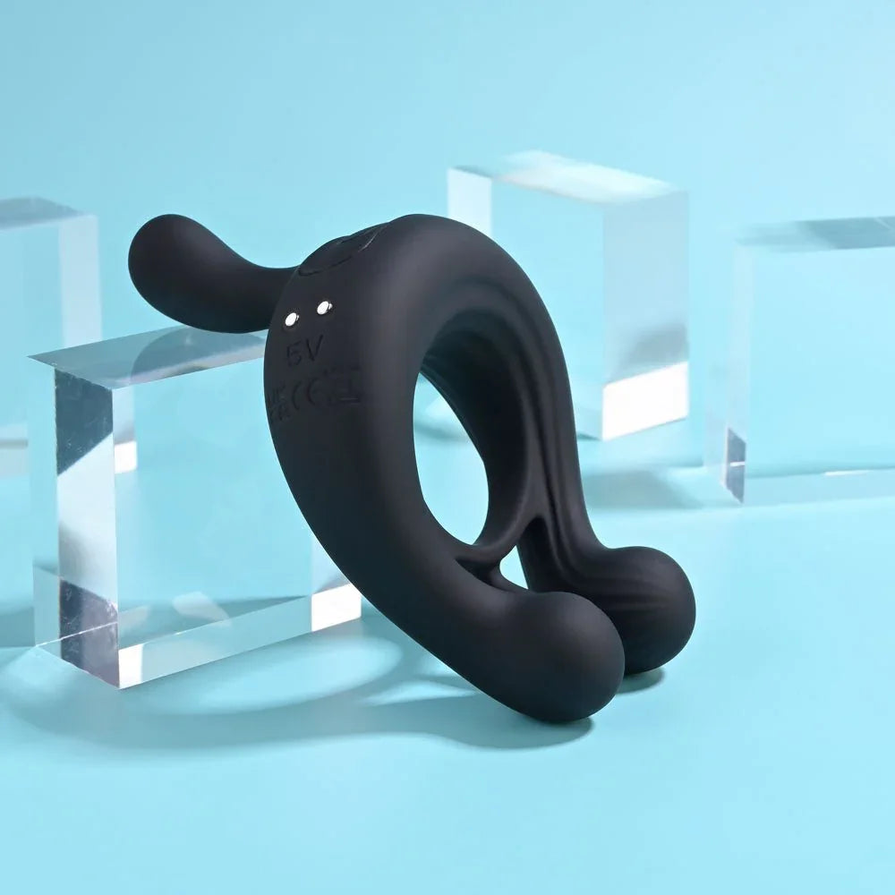 Black Triple Play ring angled to show the dual cock and ball loops and the raised tip