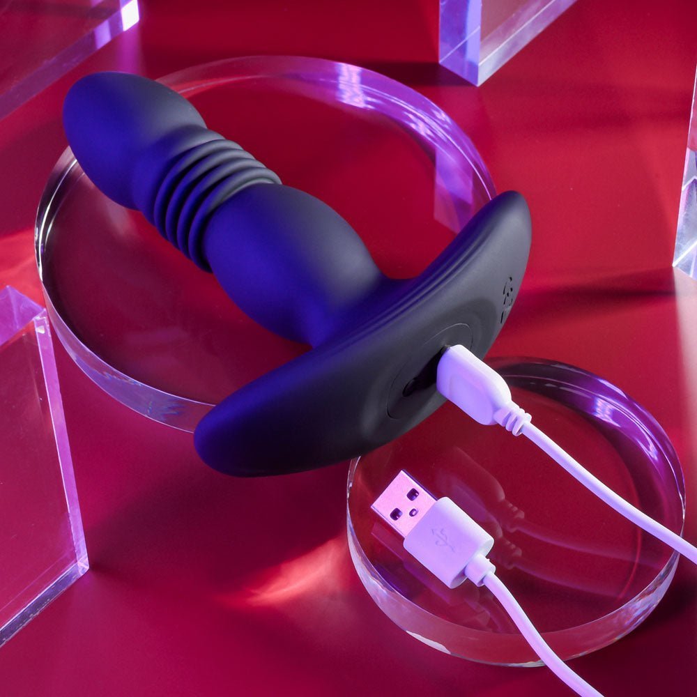 Playboy Pleasure TRUST THE THRUST - Black 13.7 cm USB Rechargeable Thrusting Butt Plug with Wireless Remote – Sex toys NZ by Naughtyhut. Discreet delivery nationwide.