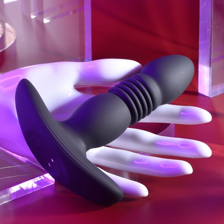 Playboy Pleasure TRUST THE THRUST - Black 13.7 cm USB Rechargeable Thrusting Butt Plug with Wireless Remote – Sex toys NZ by Naughtyhut. Discreet delivery nationwide.