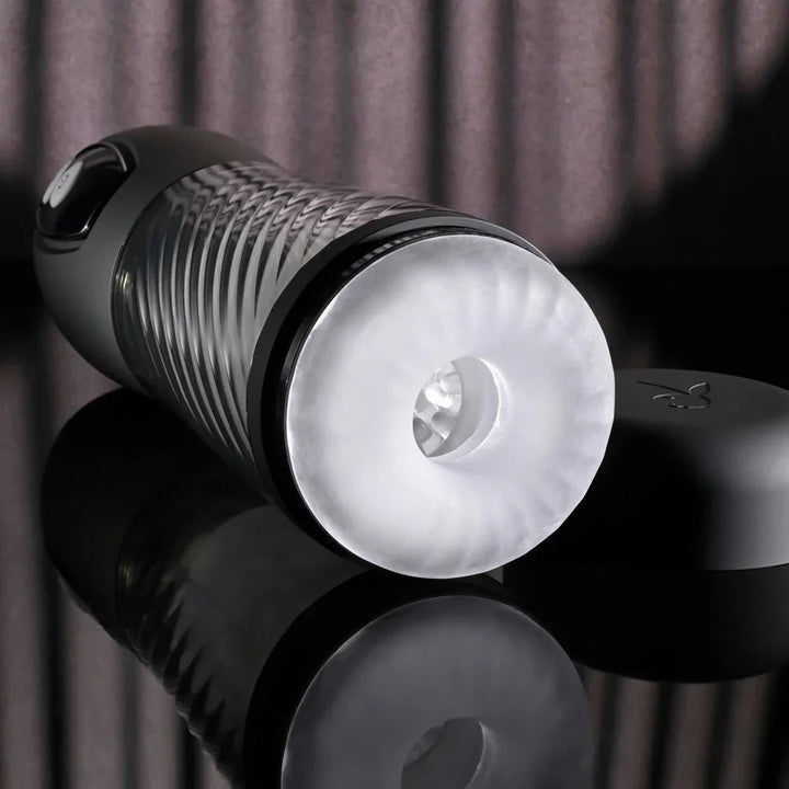 Whirlwind stroker lying on its side with the clear sleeve opening facing camera