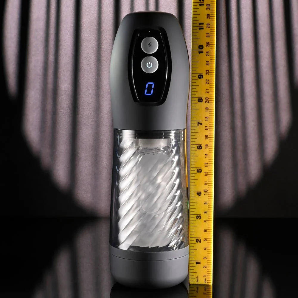Whirlwind stroker upright against a ruler at about 10 inches, display lit