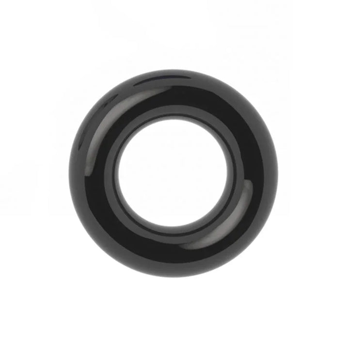 Black donut cock ring on white, showing the rounded doughnut profile