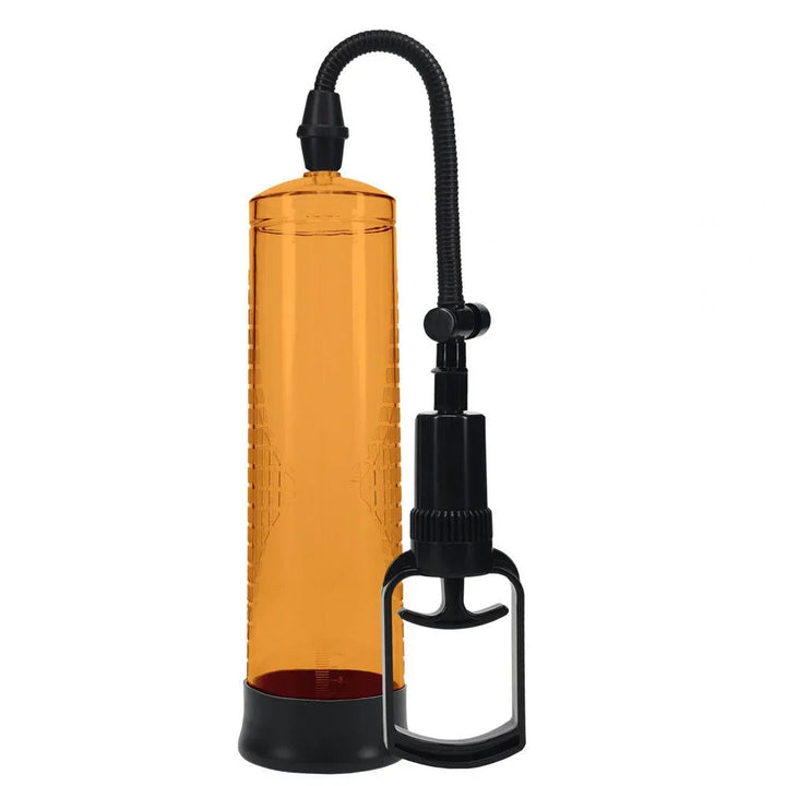 PUMPED Basic Penis Pump 2 in Orange, the orange cylinder upright with its hose and trigger handle