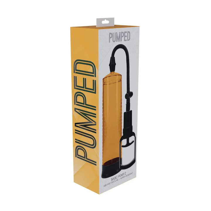 PUMPED Basic Penis Pump 2 in Orange, front of the orange retail box