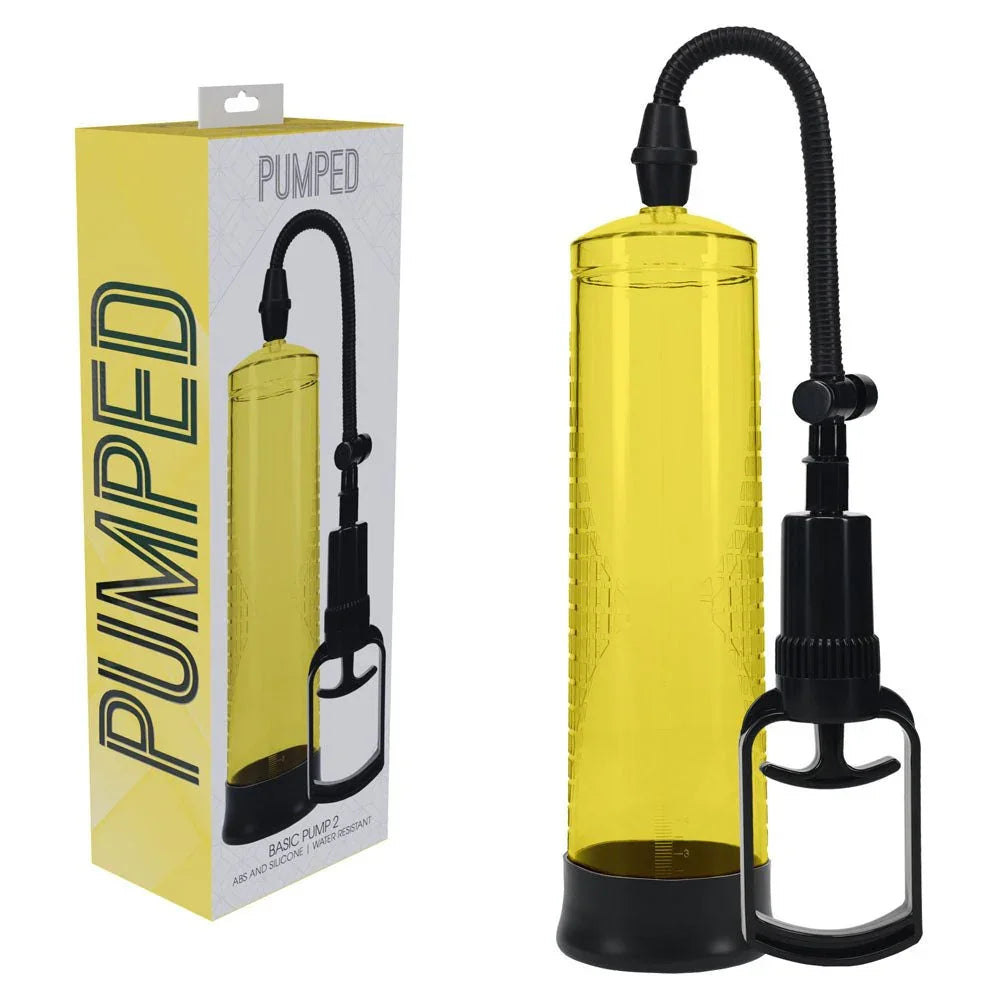 PUMPED Basic Penis Pump 2 in Yellow, yellow retail box beside the yellow cylinder and trigger handle