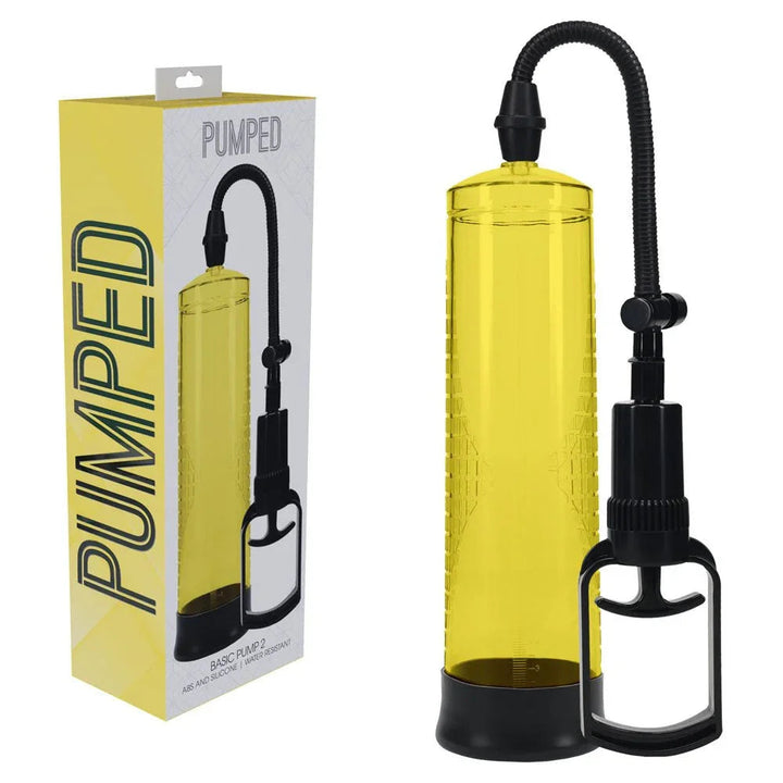 PUMPED Basic Penis Pump 2 in Yellow, yellow retail box beside the yellow cylinder and trigger handle