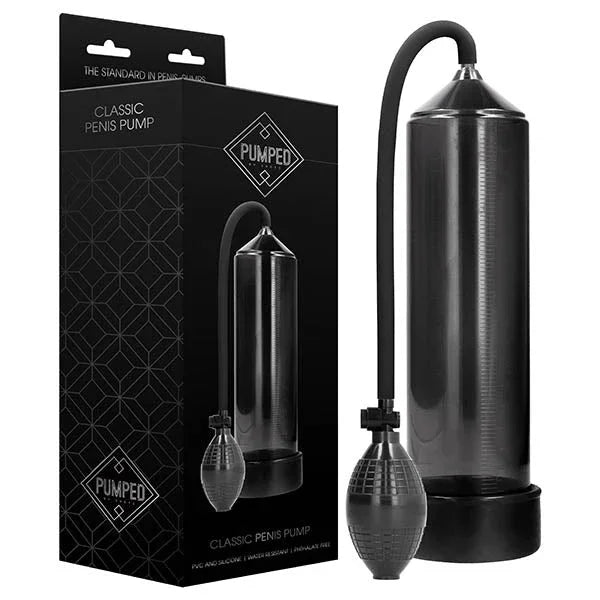 PUMPED Classic Penis Pump in Black, retail box beside the black cylinder, hose and squeeze bulb