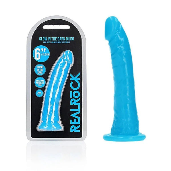 REALROCK 15.5 cm Glow in the Dark Slim Dildo in Blue, blister pack beside the neon blue dildo
