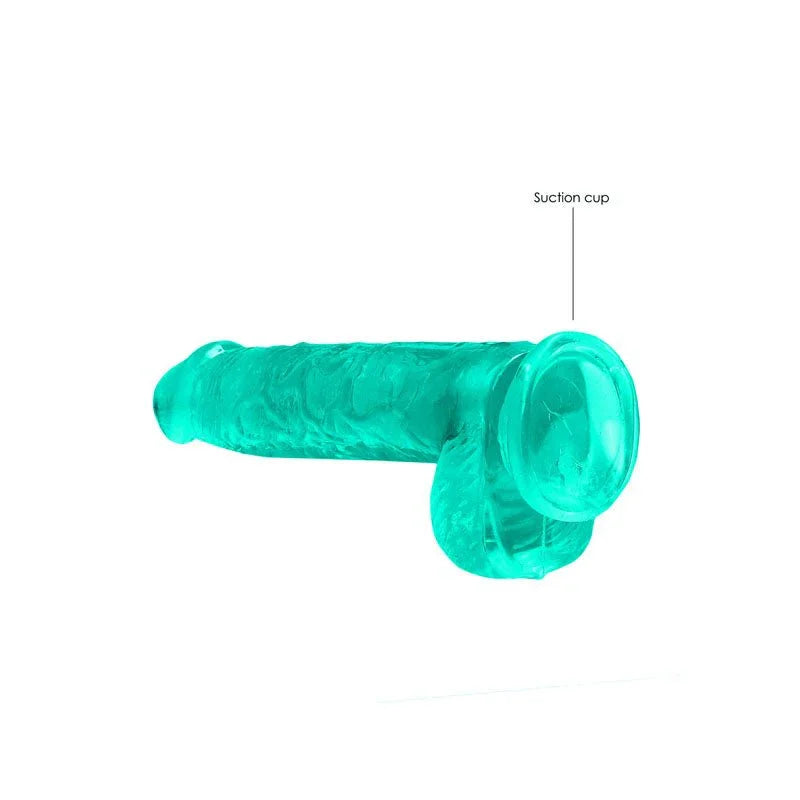 REALROCK 15.2 cm Realistic Dildo with Balls in Turquoise, lying flat with the suction cup labelled