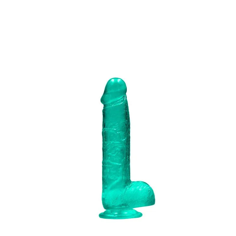 REALROCK 15.2 cm Realistic Dildo with Balls in Turquoise, standing upright on its suction base