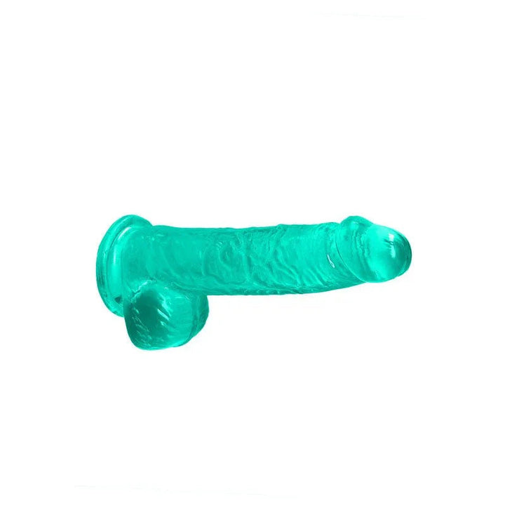 REALROCK 15.2 cm Realistic Dildo with Balls in Turquoise, lying on its side showing the full length
