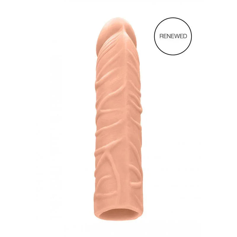 REALROCK 17.8 cm Penis Extender Sleeve in Flesh, the sleeve alone marked with a RENEWED badge